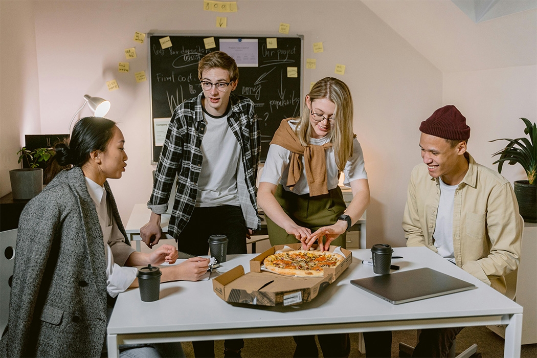 Grabbing pizza with coworkers isn’t just fun — it could boost your teamwork skills